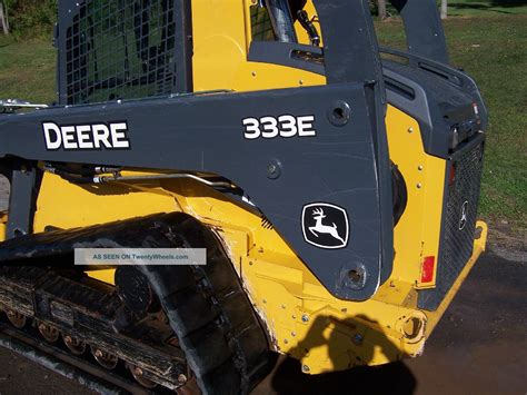 333e skid steer|john deere 333e track size.